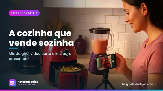 Bancada de cozinha com airfryer, cafeteira e liquidificador enquanto mulher grava vídeo com o celular