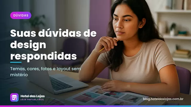 Empreendedora analisa amostras de cores e referências impressas ao lado do notebook em um estúdio claro